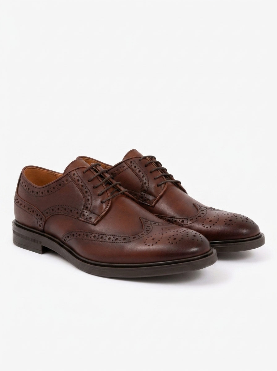Ortiz & Reed – Derbies en cuir marron disponible chez Paris Kin Shopping à Kinshasa
