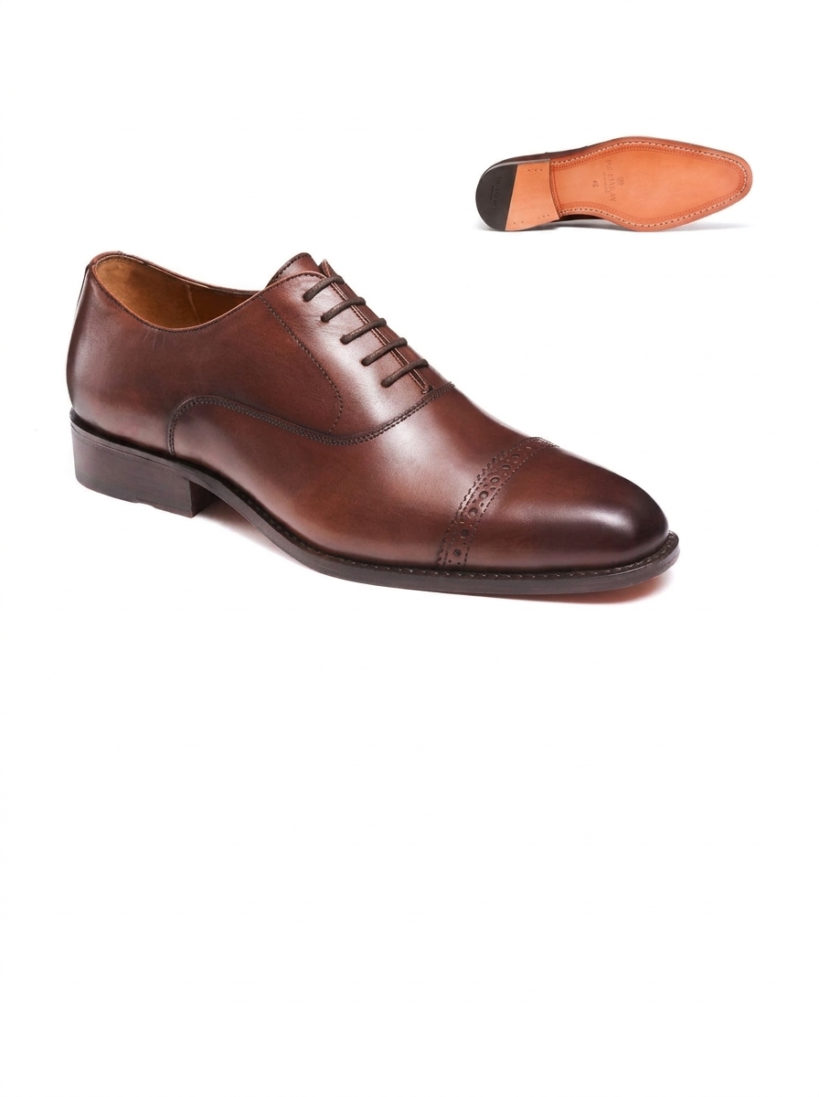 Mc Finlay – Richelieus Peter marron, semelle cuir cousue Blake disponible chez Paris Kin Shopping à Kinshasa